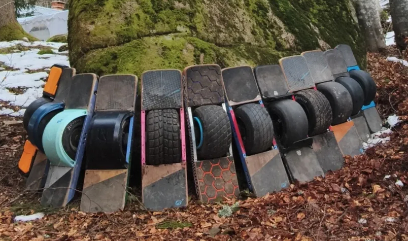 Upcoming trail ride group with one wheel boards